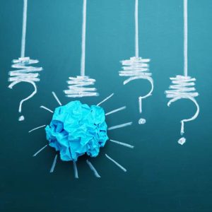 Critical Thinking - Self Study, blue paper ball with question marks on dark green background.