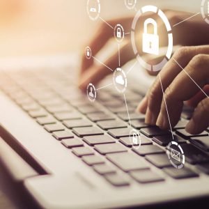 Person typing on laptop, screen displays “Cyber Security - Self Study” with digital padlock icons.