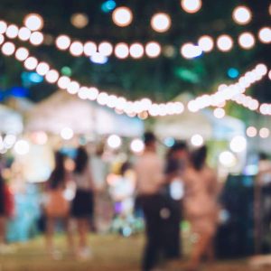 Event Planning - Self Study cover with lit-up festival scene and crowds gathered at night.